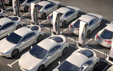 Aerial view of parked cars in dealership lot
